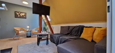 TV/Unterhaltungsangebot in der Unterkunft Central-Living yellow - Wifi - Netflix - City