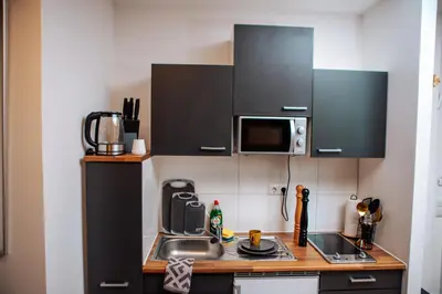 Küche/Küchenzeile in der Unterkunft Central-Living yellow - Wifi - Netflix - City
