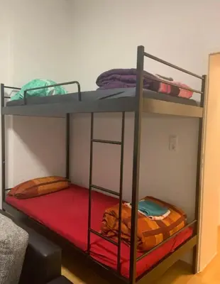 Ein Bett oder Betten in einem Zimmer der Unterkunft FeWo Born