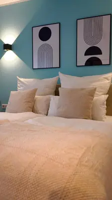 Ein Bett oder Betten in einem Zimmer der Unterkunft Zentral & Modern - 30 min bis zur Messe in Köln und Düsseldorf