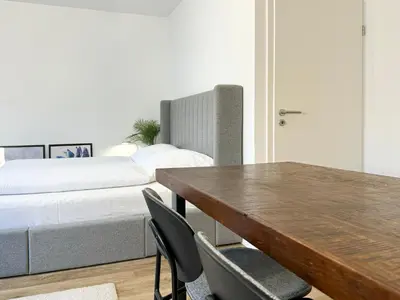Ein Bett oder Betten in einem Zimmer der Unterkunft Schöne Ferienwohnung im Zentrum mit Self Check-In und Free Wifi