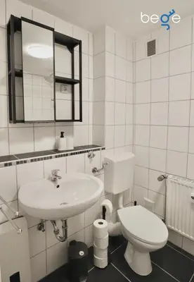 Ein Badezimmer in der Unterkunft BEGE APARTMENTS: BUSINESS QUARTERS