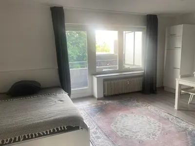Ein Bett oder Betten in einem Zimmer der Unterkunft Gemütliches Zuhause in 1A Lage