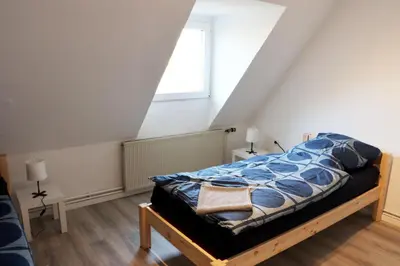 Ein Bett oder Betten in einem Zimmer der Unterkunft Calm & View Apartments in Remscheid