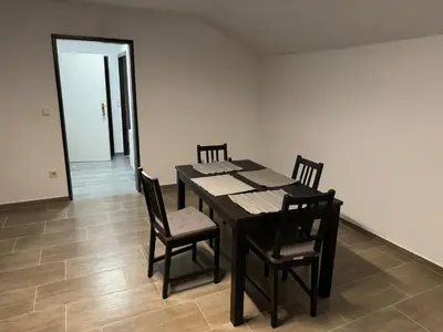 Ein Sitzbereich in der Unterkunft Wohnung mit Küche, Fernseher, WLAN und Parkplatz - Brian