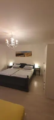 Ein Bett oder Betten in einem Zimmer der Unterkunft Ferienwohnung Hansi