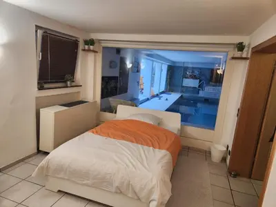 Ein Bett oder Betten in einem Zimmer der Unterkunft Villa Casa Blanca mit Privatem Schwimmbad 26 grad und Sauna