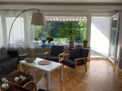 Ein Sitzbereich in der Unterkunft Ferienwohnung100qm mit Garten