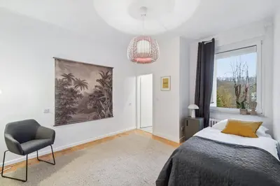 Ein Bett oder Betten in einem Zimmer der Unterkunft Altbautraum im Zooviertel - Nähe DUS & Dortmund & Köln & Essen