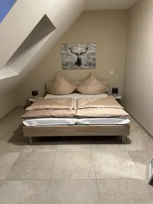 Ein Bett oder Betten in einem Zimmer der Unterkunft Ferienwohnungen Hamminkeln, Berg4Home