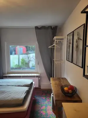 Ein Bett oder Betten in einem Zimmer der Unterkunft Ruhiges Apartment & Veranda mit guter Anbindung