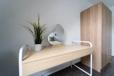Ein Bett oder Betten in einem Zimmer der Unterkunft Im Stadtzentrum / Küche / Für 5