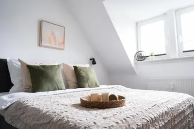 Ein Bett oder Betten in einem Zimmer der Unterkunft Im Stadtzentrum / Küche / Für 5