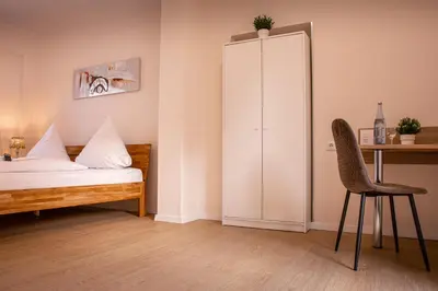 Ein Bett oder Betten in einem Zimmer der Unterkunft Hotel Hervest