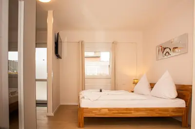 Ein Bett oder Betten in einem Zimmer der Unterkunft Hotel Hervest