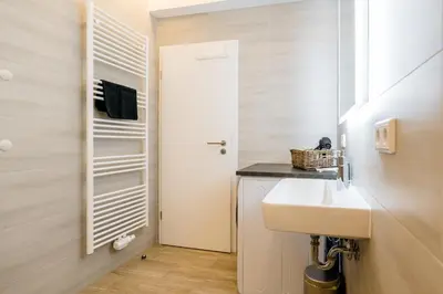 Ein Badezimmer in der Unterkunft Centerapartments Marienstrasse