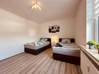 Ein Bett oder Betten in einem Zimmer der Unterkunft Zur schönen Aussicht I 90 m² I Idyllisch I Zuhause