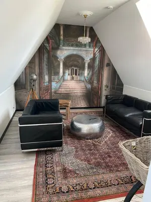 Ein Sitzbereich in der Unterkunft WorkersHome