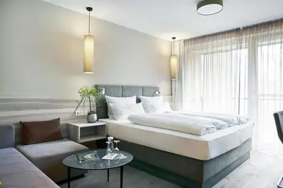 Ein Bett oder Betten in einem Zimmer der Unterkunft Landhotel Voshövel