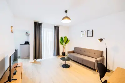 Ein Sitzbereich in der Unterkunft Glück Auf Appartements Herkulesstrasse Essen