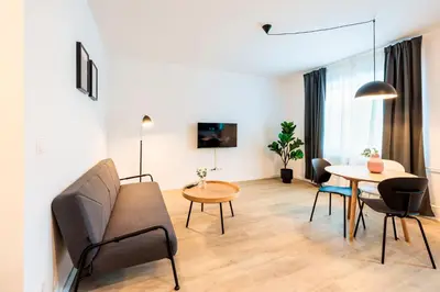Ein Sitzbereich in der Unterkunft Glück Auf Appartements Herkulesstrasse Essen
