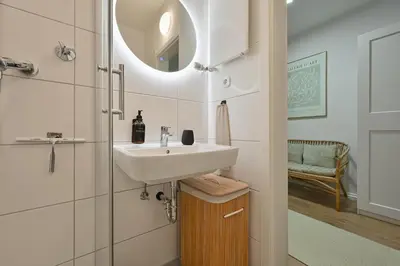 Ein Badezimmer in der Unterkunft Goodliving Apartments Studio mit Balkon & Netflix