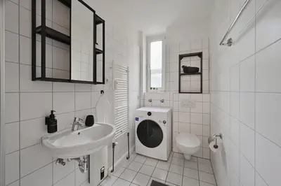 Ein Badezimmer in der Unterkunft Goodliving Apartments mit Netflix Büro und Parkplatz