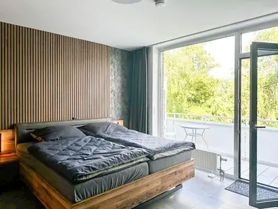 Ein Bett oder Betten in einem Zimmer der Unterkunft Apartment Düsseldorf-Lohausen II