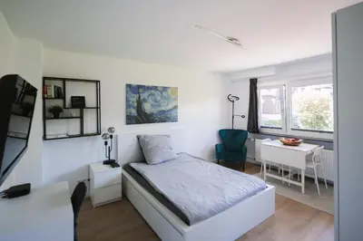 Ein Bett oder Betten in einem Zimmer der Unterkunft Modernes 1-Zimmer Appartment !