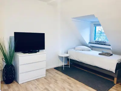 Ein Bett oder Betten in einem Zimmer der Unterkunft Solingen Bruehlerstrasse