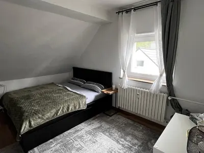 Ein Bett oder Betten in einem Zimmer der Unterkunft FlattyOne Ruhrgebiet - Schlafkomfort und Anbindung - neu renoviert
