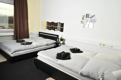 Ein Bett oder Betten in einem Zimmer der Unterkunft Pott Hostel - Essen Steele
