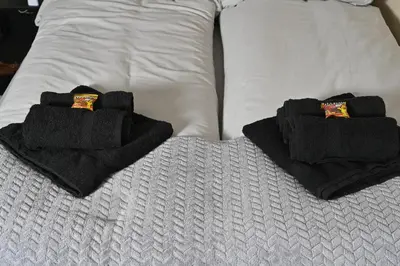 Ein Bett oder Betten in einem Zimmer der Unterkunft Pott Hostel - Essen Steele
