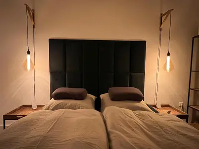Ein Bett oder Betten in einem Zimmer der Unterkunft 100m E-Ladestation - max 4 pers - Düsseldorf - Ruhrgebiet - Pilgerstätte