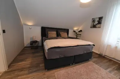 Ein Bett oder Betten in einem Zimmer der Unterkunft Apartment Am Stadtwald in Werne an der Lippe / NRW