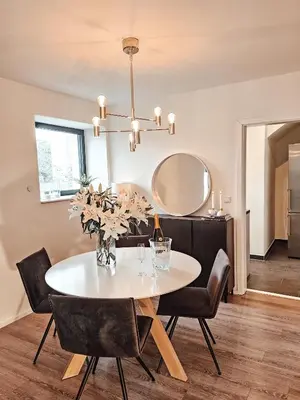 Ein Sitzbereich in der Unterkunft Modernes Appartment im Grünen