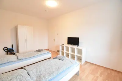 Ein Bett oder Betten in einem Zimmer der Unterkunft CoreRooms - Apartment Bochum Wattenscheid