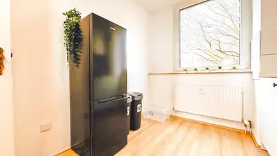 Grundriss der Unterkunft Monteurwohnung mit Balkon und Wohnzimmer