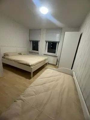 Ein Bett oder Betten in einem Zimmer der Unterkunft HomeStay