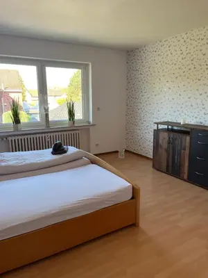 Ein Bett oder Betten in einem Zimmer der Unterkunft Red Dot Apartments
