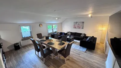 Ein Sitzbereich in der Unterkunft 24-7 Living - Unna Central City Apartments