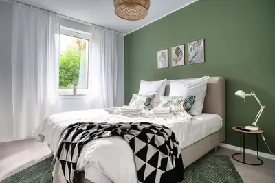 Ein Bett oder Betten in einem Zimmer der Unterkunft SpaceStays Two-Room Suite WIFI Netflix
