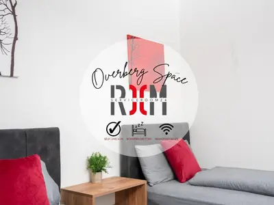 Ein Sitzbereich in der Unterkunft Serviceroom24 - Space in Recklinghausen WLAN - Smart-TV - 24-7 Check-in und Küche