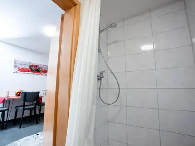 Ein Badezimmer in der Unterkunft Serviceroom24 - Space in Recklinghausen WLAN - Smart-TV - 24-7 Check-in und Küche