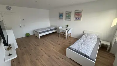 Ein Bett oder Betten in einem Zimmer der Unterkunft Monteur & Messezimmer Heiligenhaus