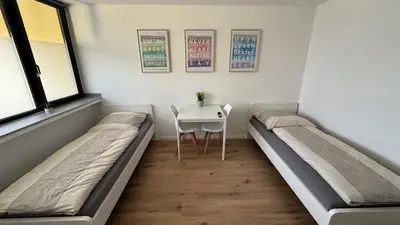 Ein Sitzbereich in der Unterkunft Monteur & Messezimmer Heiligenhaus