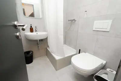 Ein Badezimmer in der Unterkunft Adrett Hotel Königsallee