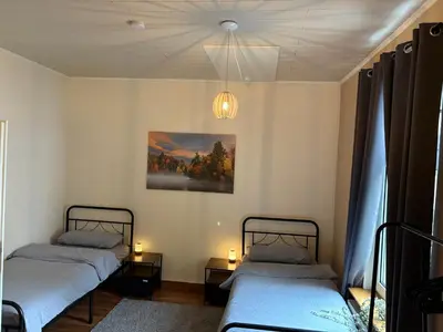Ein Bett oder Betten in einem Zimmer der Unterkunft Ferienwohnung Obernahmer