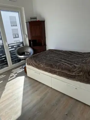 Ein Bett oder Betten in einem Zimmer der Unterkunft modern appartment near airport