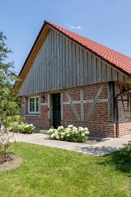 Ein Garten an der Unterkunft Weitblick - Ruhepol in münsterländer Parklandschaft